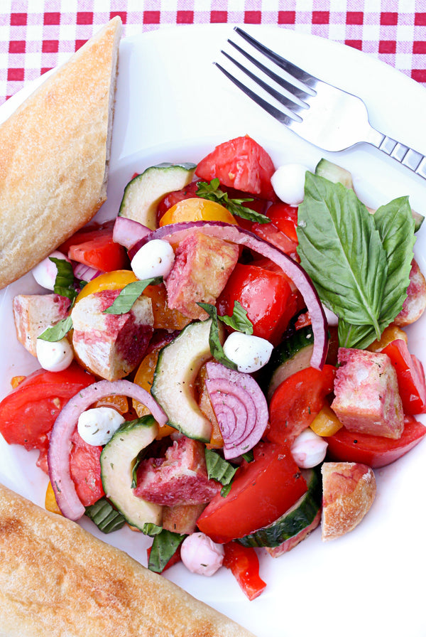 tomato mozzarella panzanella salad with spiced beet vinegar