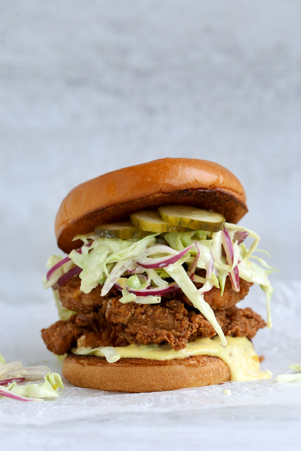Crispy Fried Chicken Sandwich with Green Tomato Jalapeno Spicy Mayo and Slaw