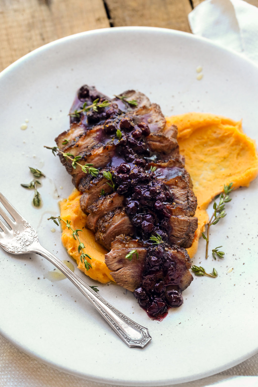 Pan Seared Spiced Duck Breast with Wild Blueberry Sauce and Sweet Potato Puree