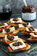 Balsamic Fig Spread on Crostini Appetizer with Gorgonzola Cheese and Prosciutto