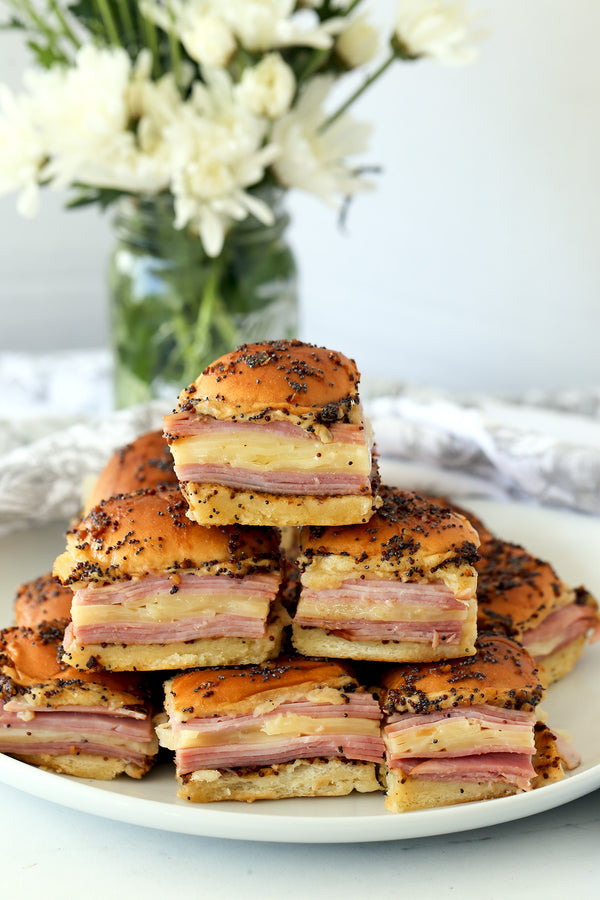 Ham and Cheese Sliders Spread with Gourmet Mustard 